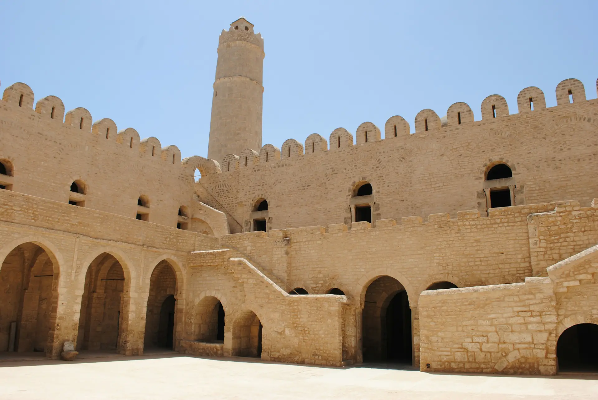Crenellated walls and round watchtower of the Sousse ribat in the old medina